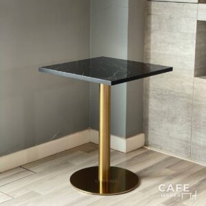 Isometric view of a black marble table featuring elegant golden leg, highlighting its sophisticated design