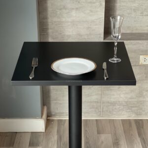 Black-top table with black and golden leg, top side view
