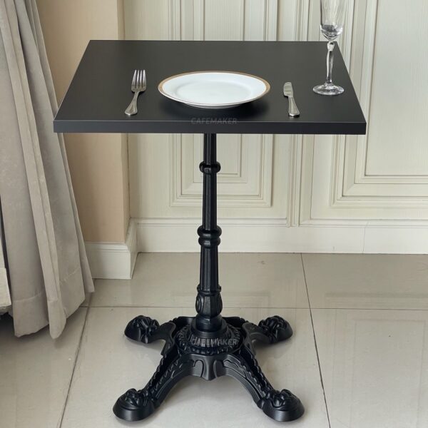 frontview of black table roman leg