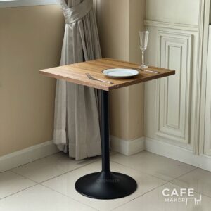 Oak top table with round leg, styled with dining set