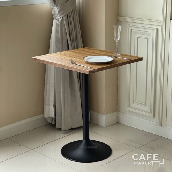 Oak top table with round leg, styled with dining set