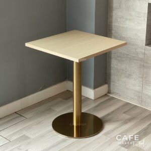 Isometric view of a parawood top table featuring elegant golden leg