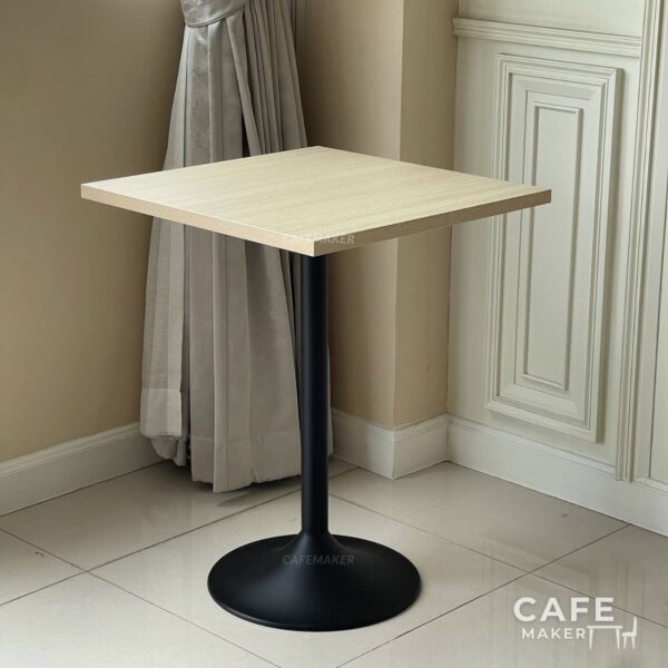 Isometric view of a table featuring a parawood top and round leg, showcasing its natural finish and design