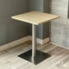 Isometric view of a parawood top table featuring sleek metal leg, showcasing its modern design