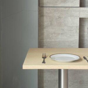 Top side view of parawood top table with square metal leg