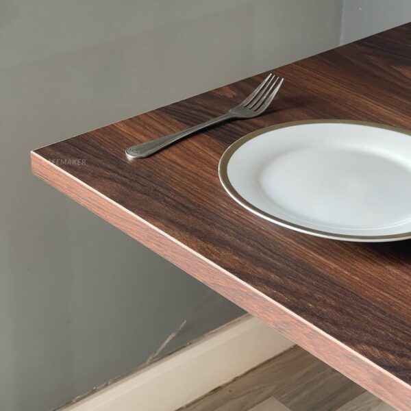 Close-up view of a walnut top table