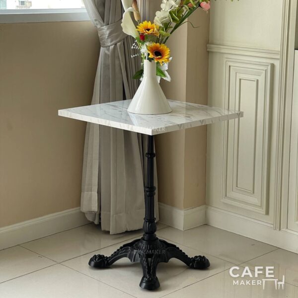 White marble table with Roman-style leg and flower decoration