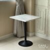 Isometric view of a white marble table with stylish legs, perfect for modern interiors