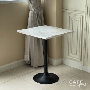Isometric view of a white marble table with stylish legs, perfect for modern interiors
