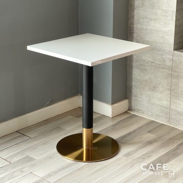 Isometric view of a white table with black-golden leg