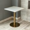 Isometric view of a white top table with golden leg