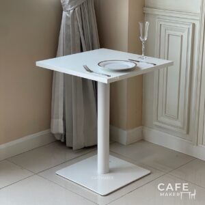 White top table with square leg styled with Dining Set