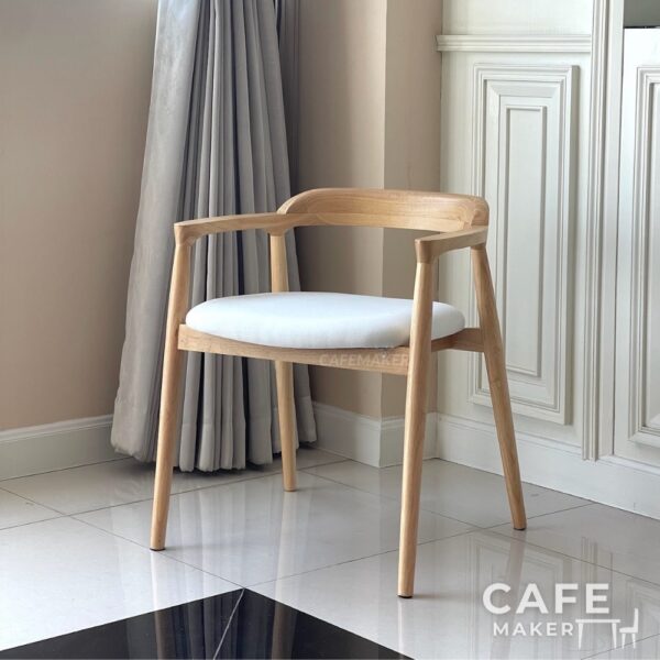 Isometric view of a natural parawood side chair with a thin backrest