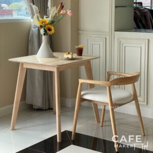 Set sample of natural parawood side chairs with thin backrests arranged in a stylish display