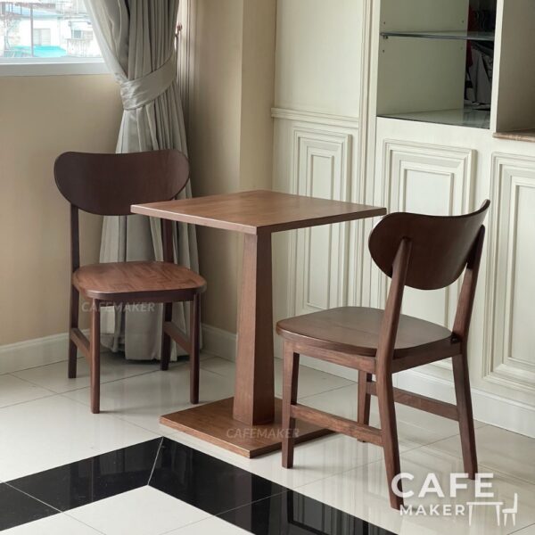Walnut parawood café chair with a curved backrest displayed in a set arrangement