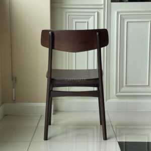 Back view of a walnut parawood café chair featuring a V-backrest