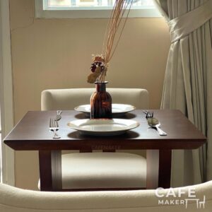 Walnut parawood café set, showcasing a coordinated table and chairs with a rich walnut finish and elegant design