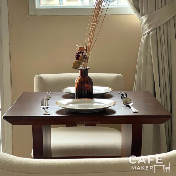 Walnut parawood café set, showcasing a coordinated table and chairs with a rich walnut finish and elegant design