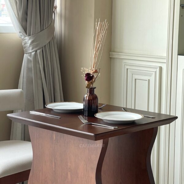 Sample Set of a walnut parawood cube table with wave-style legs