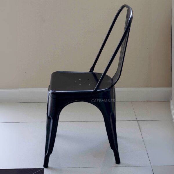 Side view of a black metal chair