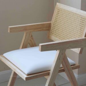 Close-up view of a natural parawood rattan chair