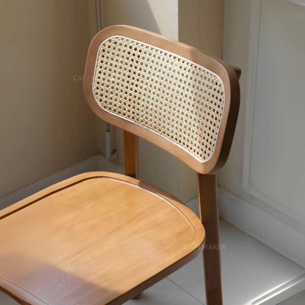 Close-up view of an oak parawood rattan chair