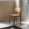 Oak parawood rattan chair in an isometric view
