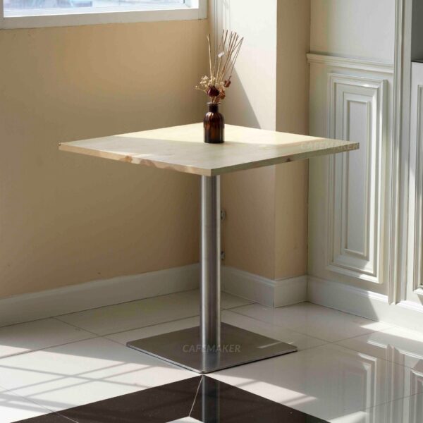 Ashwood top table with square metal leg and a flower decoration