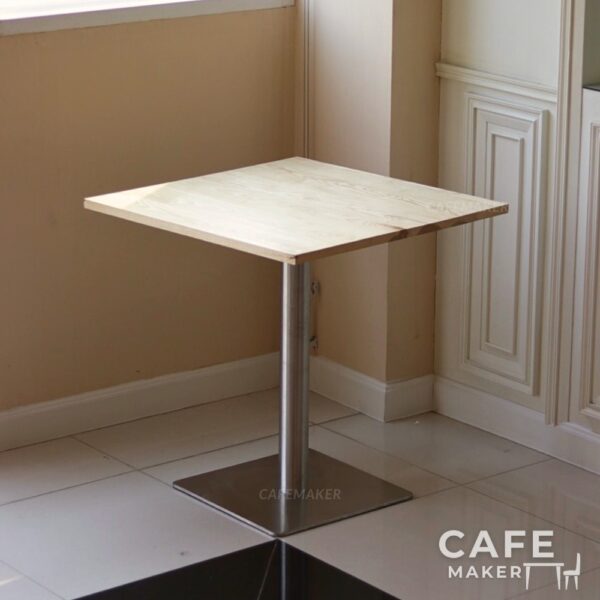 Isometric view of an ashwood top table with square metal leg