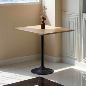 Oak top table with champagne leg and a flower decoration