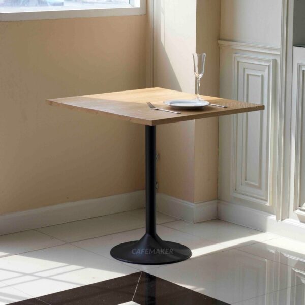 Oak top table with champagne leg used as a prop