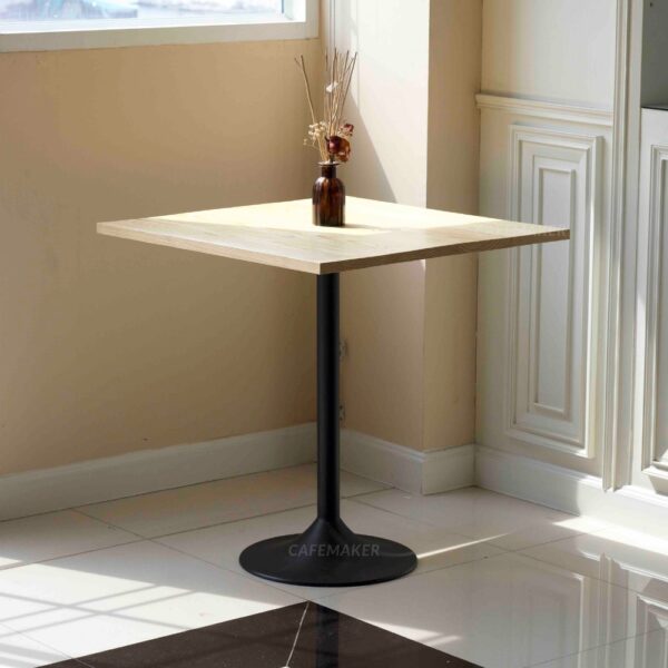 Pine top table with champagne leg and a flower decoration