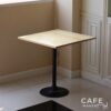 Isometric view of a pine top table with champagne leg