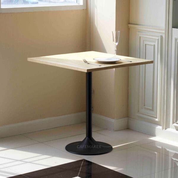 Pine top table with champagne leg used as a prop