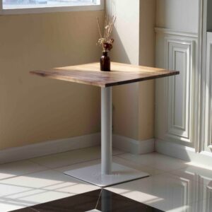 Walnut top table with white square leg and a flower decoration