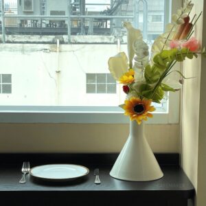 close-up of black parawood bar table 40x120x90 cm showing surface and edge detail