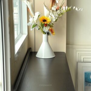 black parawood bar table 40x120x90 cm decorated with flower vase