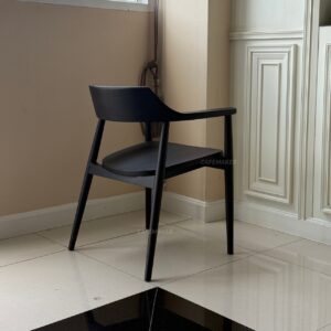 back isometric view of black parawood chair with curved backrest and wood texture