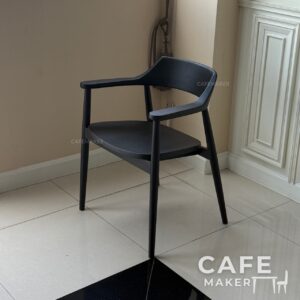 isometric view of black parawood chair with curved backrest and classic silhouette