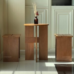 side view of natural plywood dining set with round table and backless chairs