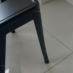 close-up view of black metal stool chair with matte finish and sturdy frame