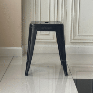 front view of black metal stool chair with slim and modern industrial design