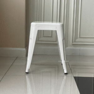 front view of white metal stool chair with slim and modern profile