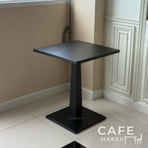 isometric view of black parawood table with rectangular top and sturdy legs