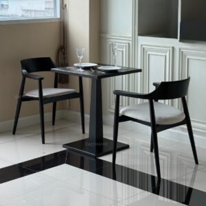 black parawood dining table set with matching chairs in modern minimalist style