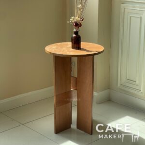 isometric view of round plywood table in natural wood finish