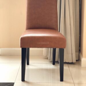 front view of orange cushion chair with wooden legs and soft upholstered seat